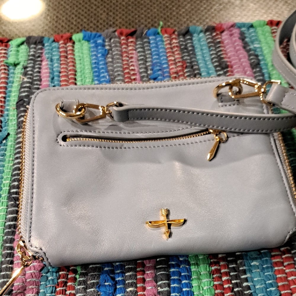 Elegant Light Blue Leather Crossbody Bag with Gold Details